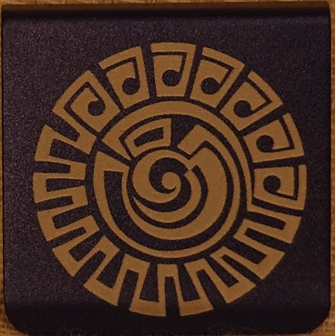 A 1.25" square hat clip with rounded corners, and a geometric doodle design featuring a tan circular spiral and geometric border design. 