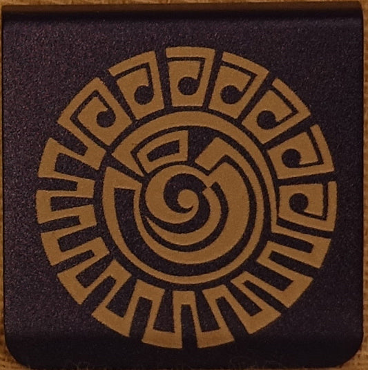 A 1.25" square hat clip with rounded corners, and a geometric doodle design featuring a tan circular spiral and geometric border design. 